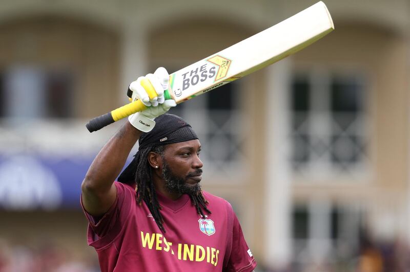 West Indies' Chris Gayle celebrates scoring half a century off just 33 balls. AP Photo