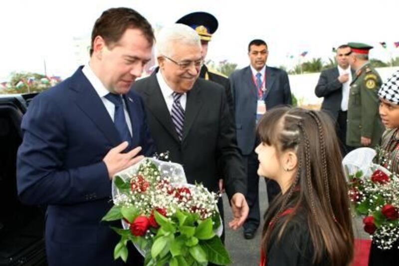 JERICHO, WEST BANK - JANUARY 18:  In this handout image provided by the Palestinian Press Office (PPO), Palestinian President Mahmoud Abbas (R) meets with Russian President Dmitry Medvedev on January 18, 2011 in Jericho, West Bank. Russian President Dmitry Medvedev met with Mahmoud Abbas, to discuss issues concerning the peace process which stalled several months ago, over the issue of continued settlement building in the West Bank and east Jerusalem.   (Photo by Thaer Ganaim/PPO via Getty Images) *** Local Caption ***  GYI0063097845.jpg