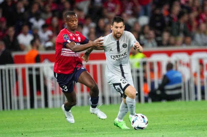 Tiago Djalo of Lille competes for the ball with Lionel Messi of PSG. Getty Images