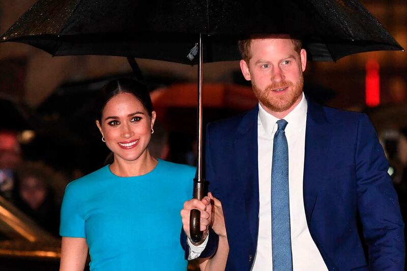 (FILES) In this file photo taken on March 5, 2020 Britain's Prince Harry, Duke of Sussex (R) and Meghan, Duchess of Sussex arrive to attend the Endeavour Fund Awards at Mansion House in London. Prince Harry and Meghan Markle filed a lawsuit July 23 in Los Angeles against one or more paparazzi whom they accuse of taking pictures of their son without permission, their lawyer told AFP. / AFP / DANIEL LEAL-OLIVAS
