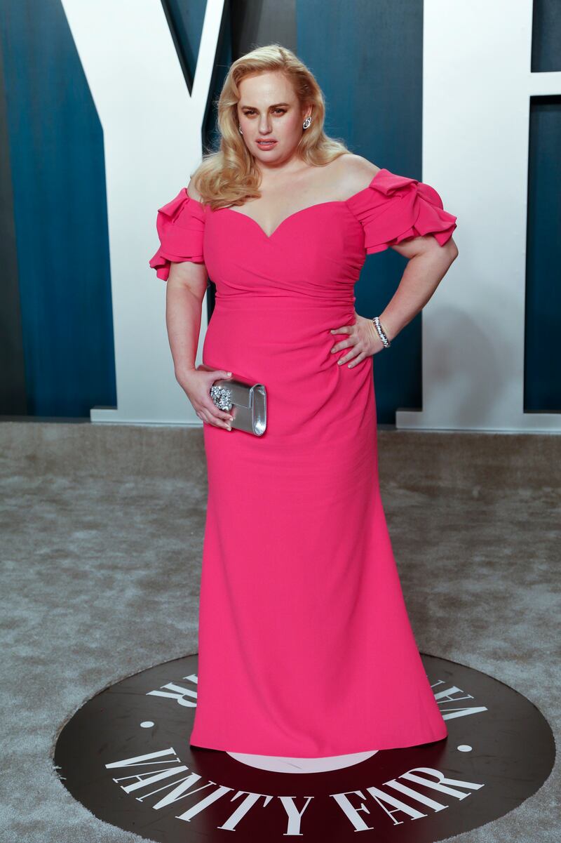 Rebel Wilson, wearing pink ruffled Badgley Mischka, attends the Vanity Fair Oscar Party on February 9, 2020. EPA