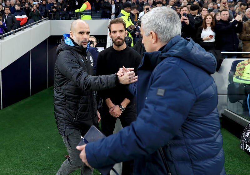 LONDON, ENGLAND - FEBRUARY 02: Jose Mourinho, Manager of Tottenham Hotspur greets Pep Guardiola, Manager of Manchester City prior to the Premier League match between Tottenham Hotspur and Manchester City at Tottenham Hotspur Stadium on February 02, 2020 in London, United Kingdom. (Photo by Matt McNulty - Manchester City/Manchester City FC via Getty Images)