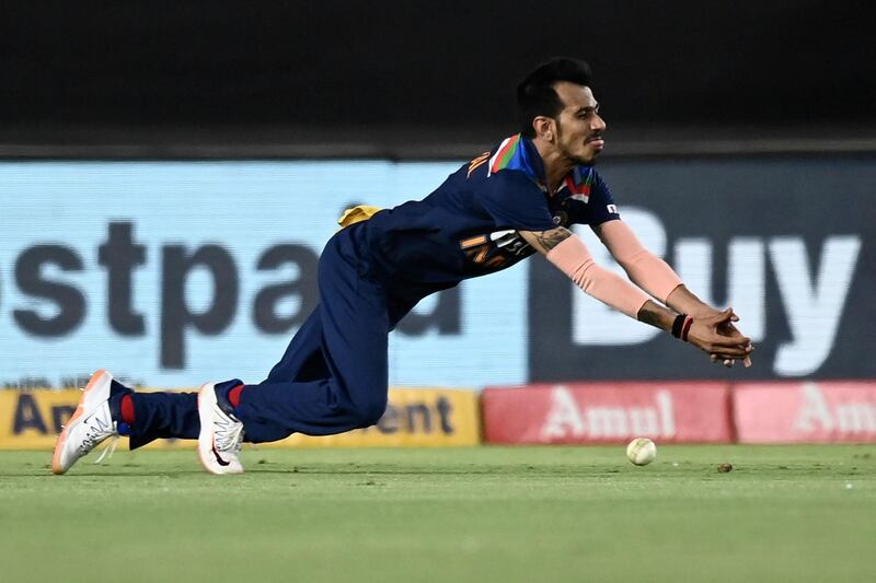 India fielder Yuzvendra Chahal misses a chance to catch out England's Jonny Bairstow (not pictured) during the third Twenty20 international cricket match at the Narendra Modi Stadium in Ahmedabad on Tuesday, March 16. England won the match by eight wickets. AFP