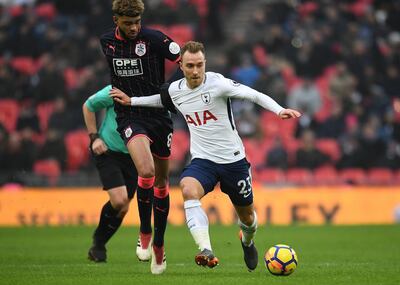 epa06577536 Tottenham's Christian Eriksen vies for the ball with Huddersfield's Philip Billing (L) during the English Premier League soccer match Tottrenham vs Huddersfield at Wembley Stadium in London, Britain, 03 March 2018.  EPA/ANDY RAIN EDITORIAL USE ONLY. No use with unauthorized audio, video, data, fixture lists, club/league logos or 'live' services. Online in-match use limited to 75 images, no video emulation. No use in betting, games or single club/league/player publications