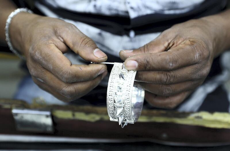 SHARJAH , UNITED ARAB EMIRATES , OCT 24   – 2017 :- Surenderan K from Kerala , India making silver jewellery at the Al Baroon silver shop in the Al Mareija area near the Heritage area in Sharjah. He is working in this shop for the last 15 years. (Pawan Singh / The National) For Weekend