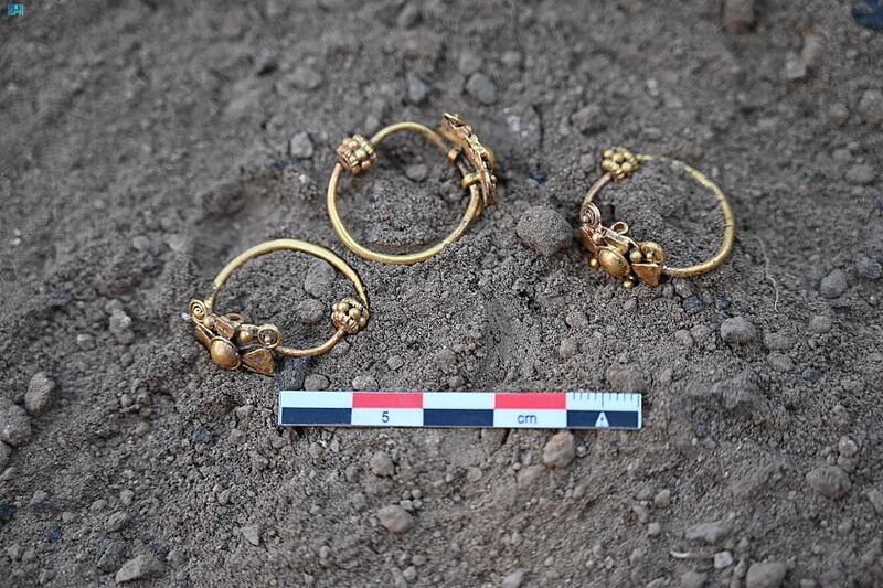 Three ancient rings discovered at Al-Ukhdood archaeological site. They feature butterfly-shaped motifs on top. Photo: Heritage Commission