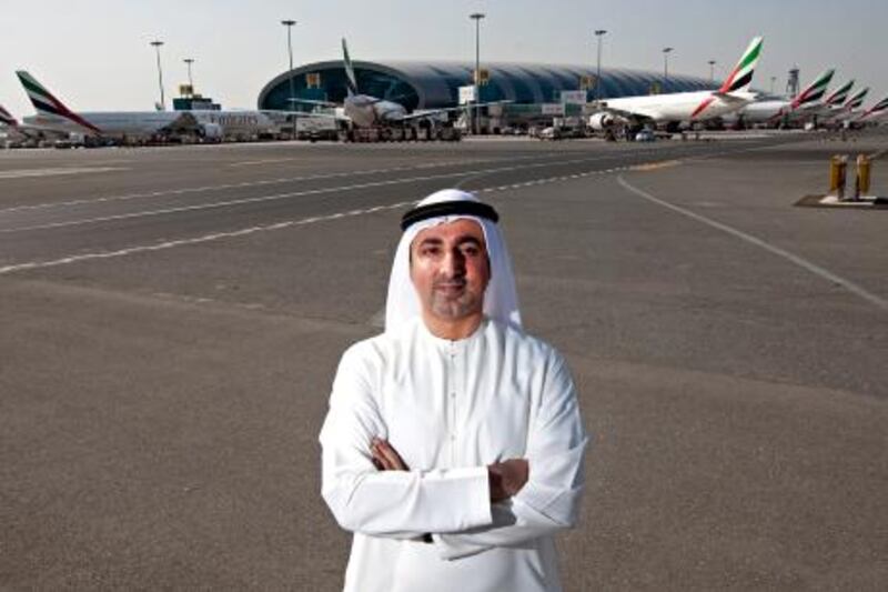 Deira, November 28, 2011 - Amer Kazim, Senior Vice President of Group Services at Dubai International Airport, saw his first takeoffs and landings with his sister and brother at age 8 when their father would bring them to the airport and they would watch the planes from their car. "It was a weekly routine for us and we would be able to determine the airline by the plane's tail colors," Kazim said at the airport in Dubai, November 29, 2011. (Photo by Jeff Topping/The National)
