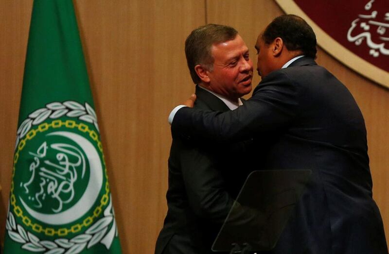 Jordan’s King Abdullah II greets Sudan’s president Omar Al Bashir, right. Mohammad Hamed / Reuters