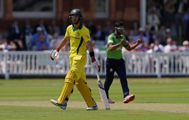 LONDON, ENGLAND - JUNE 09: Glenn Maxwell of Australia walks off after been bowled lbw by Ravi Patel (R) of Middlesex during the One Day Tour match between Middlesex and Australia at Lord's Cricket Ground on June 9, 2018 in London, England. (Photo by Henry Browne/Getty Images)