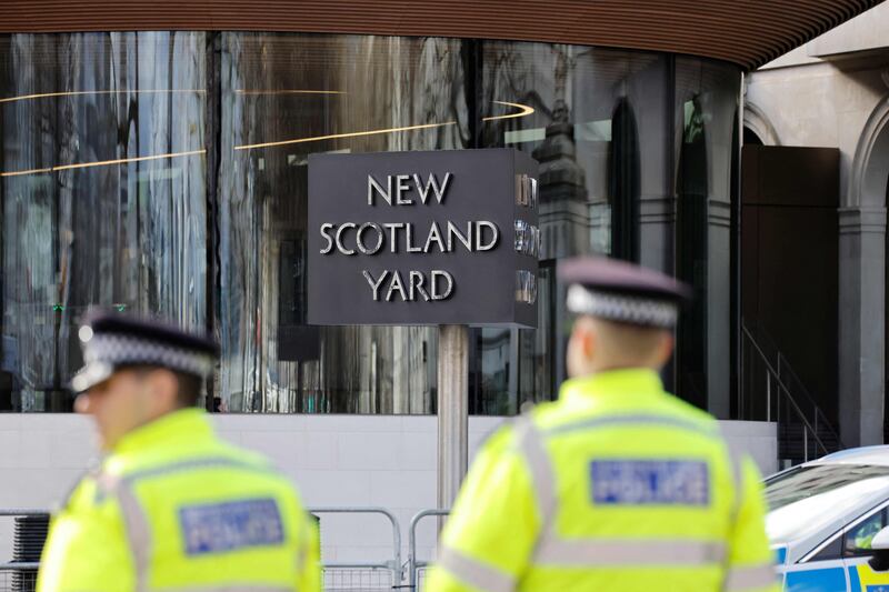 Scotland Yard in central London. Officers are searching for a man after a woman was stabbed to death in the UK capital. AFP