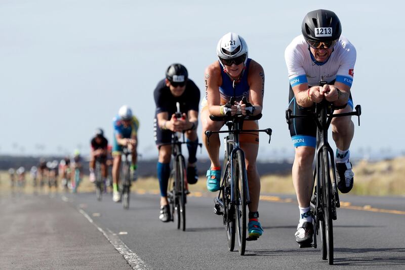 Triathletes compete in the Ironman World Championship Triathlon, in Hawaii, on Saturday, October 12. AP