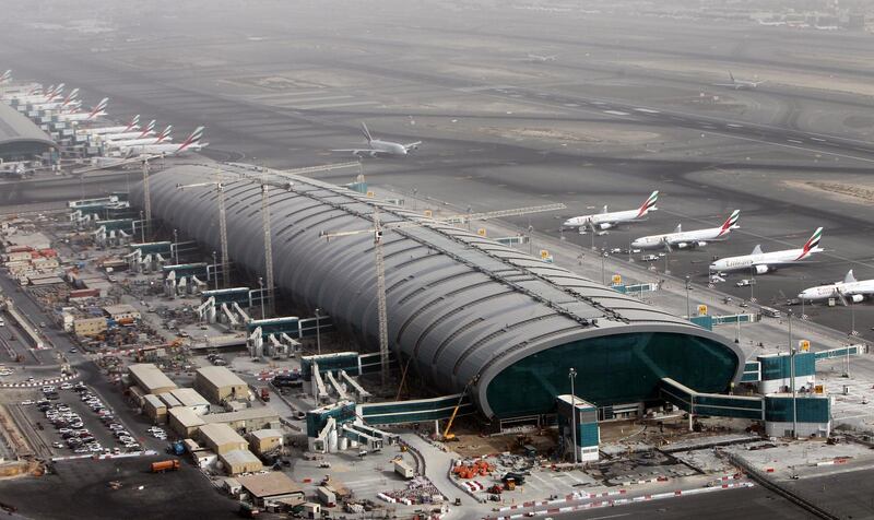 epa06977148 (FILE) - Aircrafts of the Emirates Airlines parking at the Dubai International airport in the Gulf emirate of Dubai, United Arab Emirates, 27 May 2012  (reissued 27 August 2018). The United Arab Emirates General Authority of Civil Aviation on 27 August 2018 denied reports that UAE air traffic was disrupted after an alleged Houthi drone attack. Iran- and Houthi-affiliated media reported claims that Houthi militias from Yemen had carried out a drone attack on Dubai airport.  EPA/ALI HAIDER