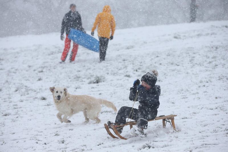 People go sledging in the snow on Parliament Hill on Hampstead Heath in London, United Kingdom. Parts of the country saw snow and icy conditions as arctic air caused temperatures to drop. Getty Images