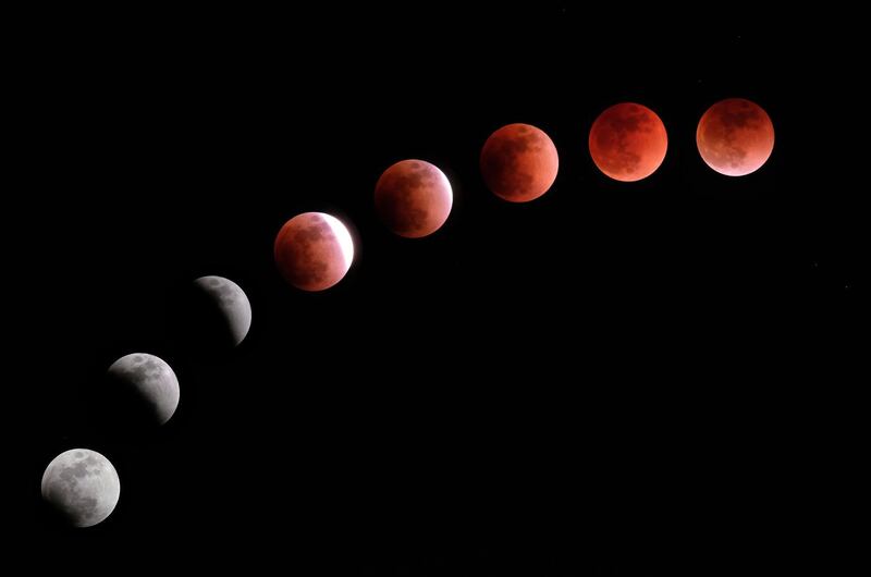 This composite image shows the moon during a lunar eclipse referred to as the "super blue blood moon" in Tokyo, Japan. Kazuhiro NOogi / AFP Photo.