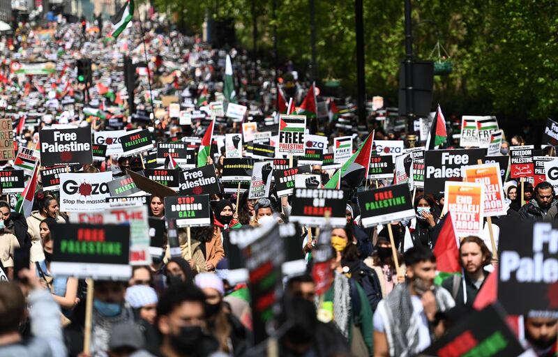 epa09220501 Thousands of supporters of Palestine attend a Palestine solidarity demonstration in central London, Britain, 22 May 2021. Ceasefire between Israel and the Palestinian militant group Hamas in the Gaza Strip was announced on 21 May, after an 11-day war.  EPA/ANDY RAIN
