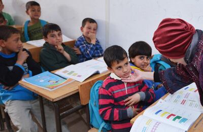 Sheikha Jawaher on a visit to the Zaatari refugee camp in Jordan in 2014. Courtesy Sheikha Jawaher