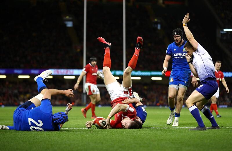 Josh Adams of Wales scores his sides fifth try against Italy at Principality Stadium in Cardiff on Saturday, February 1. Getty