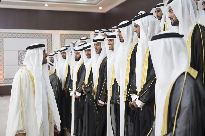 Sheikh Mohammed bin Zayed, Crown Prince of Abu Dhabi Deputy Supreme Commander of the Armed Forces speaks with the grooms during their group wedding at Mushrif Palace. Mohamed Al Hammadi / Crown Prince Court - Abu Dhabi
