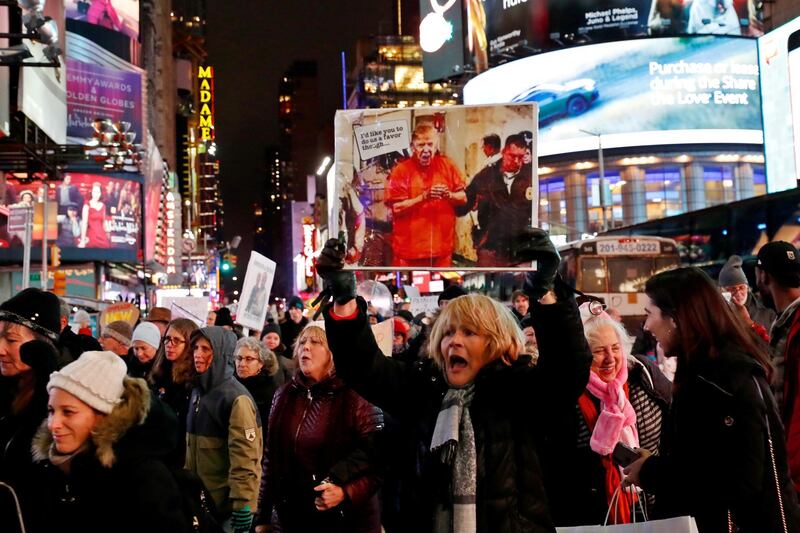Demonstrators gather  at Times Square in New York City. Reuters
