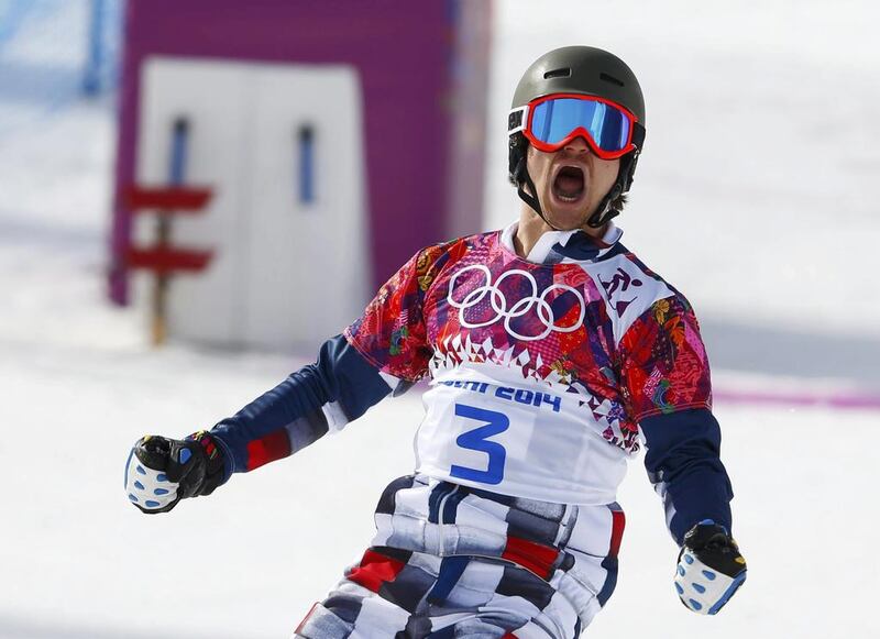 Russia’s Vic Wild won the men’s parallel snowboard finals on Saturday for his second gold medal. Mike Blake / Reuters

