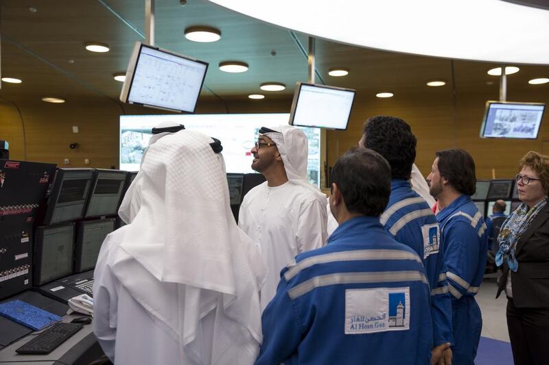 Sheikh Mohammed bin Zayed, centre, Crown Prince of Abu Dhabi and Deputy Supreme Commander of the UAE Armed Forces, tours the main building of the Al Hosn gas facility. Ryan Carter / Crown Prince Court - Abu Dhabi