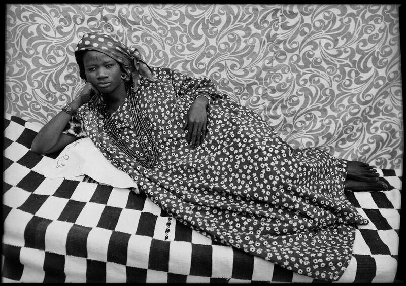 Photos by the Malian photographer Seydou Keïta on display at Leila Heller Gallery. Courtesy Seydou Keïta / SKPEAC 