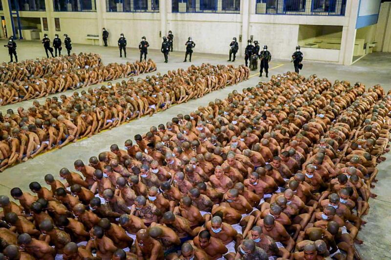 Gang members are secured during a police operation at Izalco jail during a 24-hour lockdown ordered by El Salvador's President Nayib Bukele in Izalco, El Salvador. Reuters