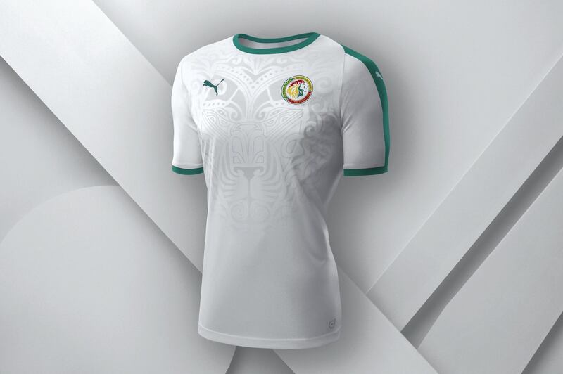 14 Senegal ||
The look: The Senegalese football association has been playful with their kits. At the African Cup of Nations Sadio Mane and co wore a lion roaring on their right shoulder. The 2018 edition, a crisp white with green trim, has been toned down and the lion is faded into the strip.  ||
Would I wear it? Yes ||
Photo Courtesy Puma