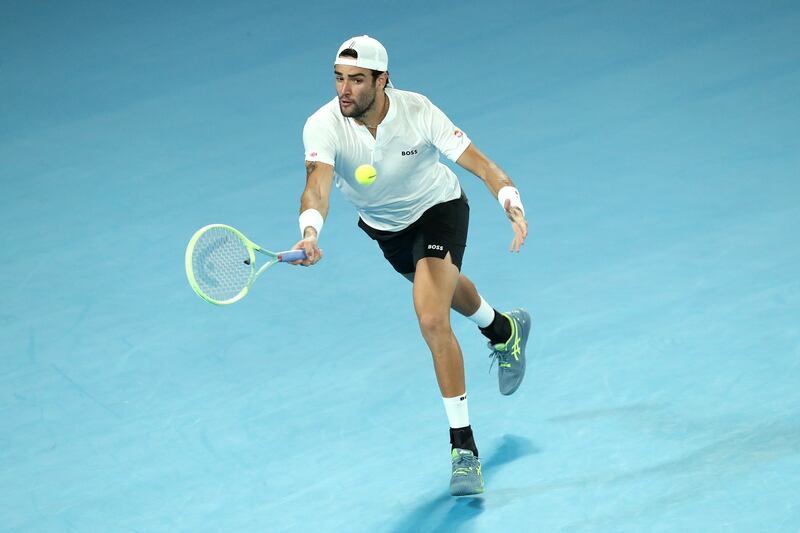 Matteo Berrettini plays a return to Andy Murray. Getty