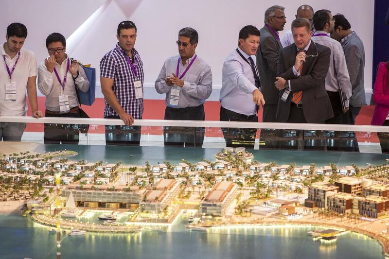 Visitors view a scaled version of La Mer, a mixed-use development announced by Meraas. Antonie Robertson / The National