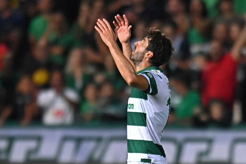 Omonia's Iranian forward Karim Ansarifard celebrates after scoring the opening goal against United. AFP