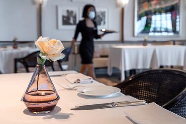 Abu Dhabi, United Arab Emirates, June 15, 2020. Distanced tables at the Cafe Milano at the Four Seasons Hotel, Abu Dhabi. Victor Besa / The National Section: If Reporter: Janice Rodrigues