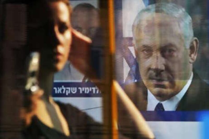 A picture of Likud Party leader and the former Israeli prime minister Benjamin Netanyahu is seen on a bus in Jerusalem.