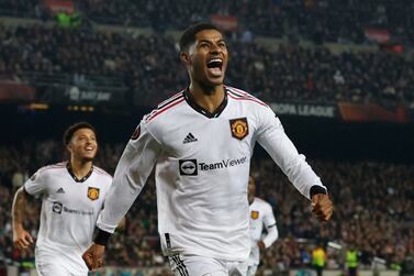 Soccer Football - Europa League - Play-Off First Leg - FC Barcelona v Manchester United - Camp Nou, Barcelona, Spain - February 16, 2023  Manchester United's Marcus Rashford celebrates after FC Barcelona's Jules Kounde scored an own goal and the second for Manchester United REUTERS / Albert Gea