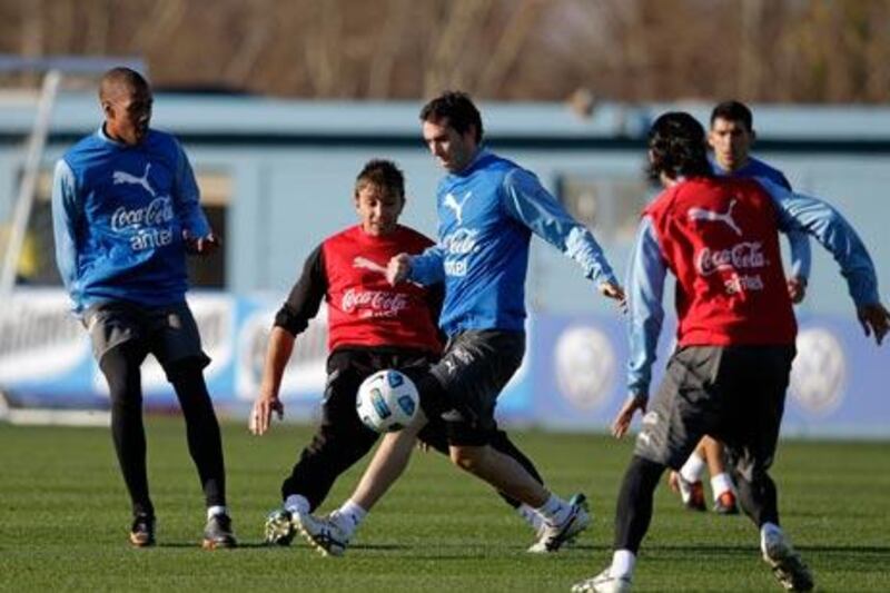 Uruguay’s players train for tonight’s final where they will face neighbours Paraguay.