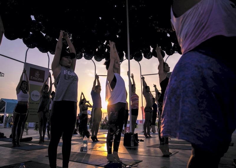 DUBAI, UNITED ARAB EMIRATES. 18 OCTOBER 2019. 
Yoga at Kite Beach Fitness Village.

The city launches the third edition of the Dubai Fitness Challenge (DFC) today with wide range of activities across the city that will be accessible to the entire Dubai community.   Here, Kites Beach is converted into a dedicated fitness village with different zones for free outdoor activities.

(Photo: Reem Mohammed/The National)

Reporter:
Section: