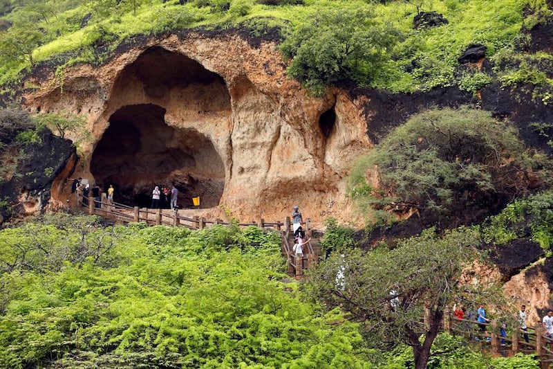 Tourists visit a cave at Ain Razat, a water spring in Salalah, Dhofar province, on August 20, 2016. Ahmed Jadallah/Reuters