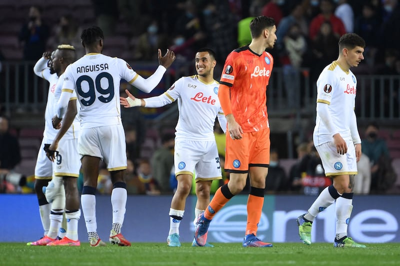 Napoli's players react at the end of the Europa League match against Barcelona. AFP