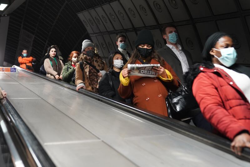 Commuters at Waterloo underground station in London on Thursday after the government lifted its working from home advice. PA