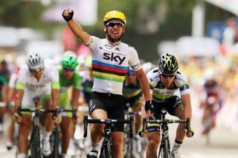 World Road Race Champion Mark Cavendish of Great Britain and Team Sky celebrates winning stage two. Bryn Lennon / Getty Images