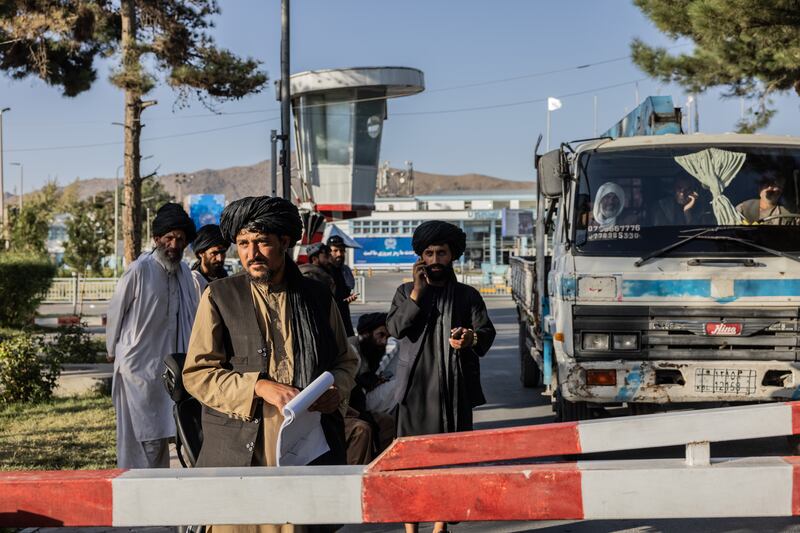 People leaving Kabul airport. Stefanie Glinski for The National