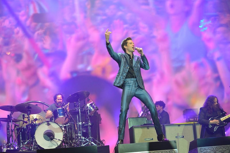GLASTONBURY, ENGLAND - JUNE 29:   Brandon Flowers of The Killers performs live on the Pyramid stage during day four of Glastonbury Festival at Worthy Farm, Pilton on June 29, 2019 in Glastonbury, England. The festival, founded by farmer Michael Eavis in 1970, is the largest greenfield music and performing arts festival in the world. Tickets for the festival sold out in just 36 minutes as it returns following a fallow year. (Photo by Jim Dyson/Getty Images)