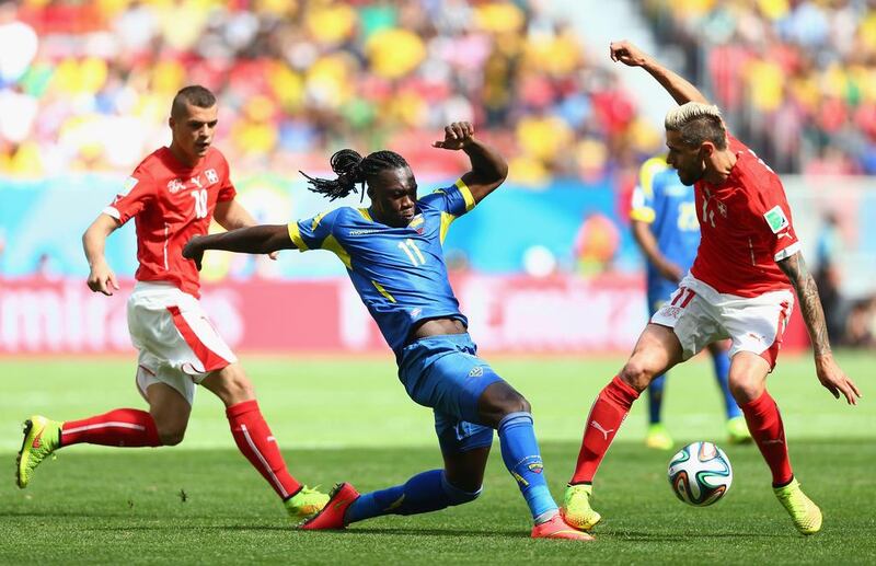 Felipe Caicedo, who plays his club football with UAE's Al Jazira, of Ecuador controls the ball against Valon Behrami of Switzerland during their 2014 World Cup Group E match on Sunday in Brasilia, Brazil. Clive Brunskill / Getty Images
