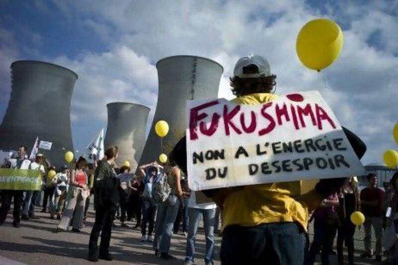 Protesters in the central eastern French city of Saint-Vulbas call for the closure of France's nuclear power plants. Jean-Philippe Ksiazek / AFP