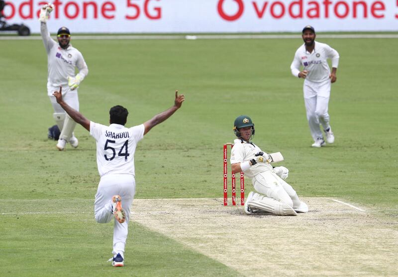 India bowler Shardul Thakur celebrates after dismissing Australia's Marcus Harris for 38. AP