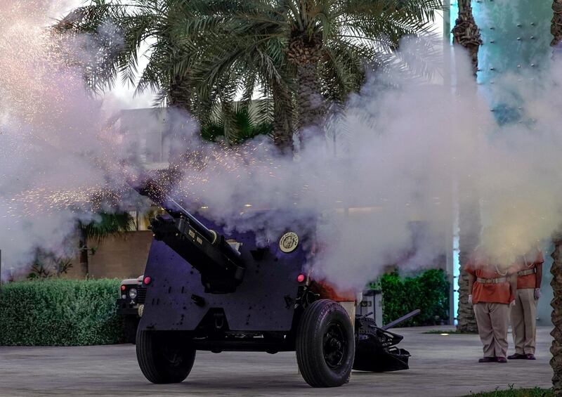 Abu Dhabi, United Arab Emirates, April 24, 2020.    
  First day of Ramadan.  A canon is fired to mark the beginning of iftar at the Umm Al Emarat Park, Abu Dhabi.
Victor Besa / The National
Section:  NA
For:  Standalone/Stock Images