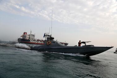 An Iranian Revolutionary Guard speedboat moves around a British-flagged oil tanker, the Stena Impero, in the Iranian port of Bandar Abbas AP