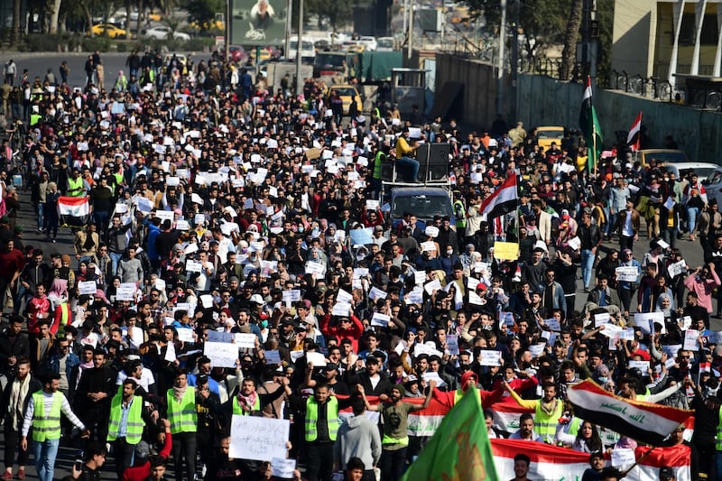 Iraqi university students take part in a protest in central Baghdad, Iraq.  EPA