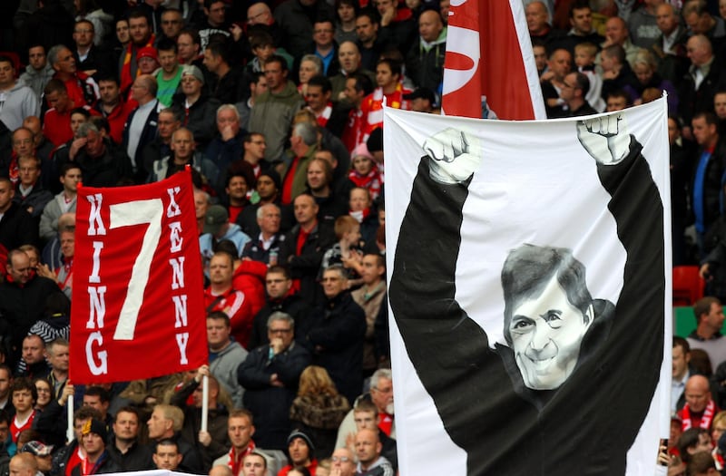 LIVERPOOL, ENGLAND - MAY 15:  Liverpool fans display banners dedicated to former player and now manager, Kenny Dalglish during the Barclays Premier League match between Liverpool and Tottenham Hotspur at Anfield on May 15, 2011 in Liverpool, England.  (Photo by Michael Steele/Getty Images)