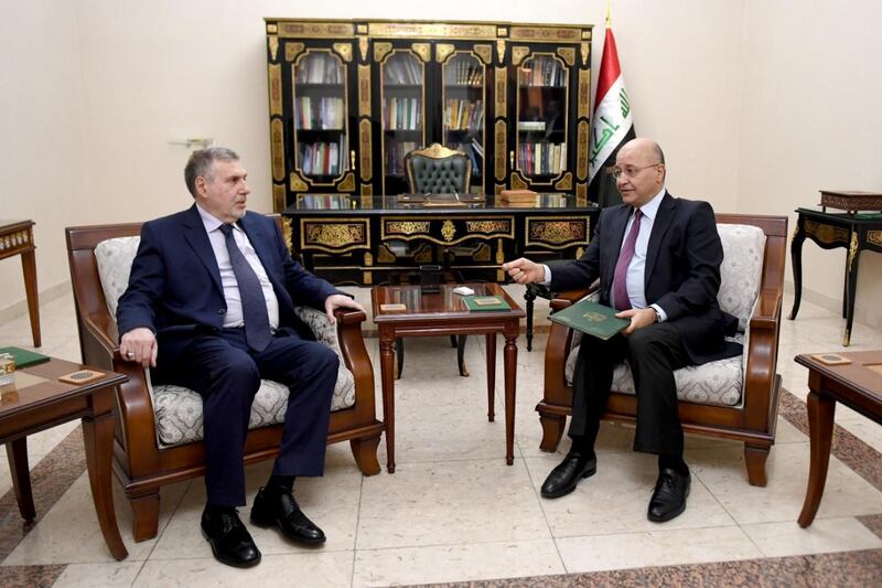 Iraq's President Barham Salih instructs newly appointed Prime Minister Mohammed Tawfiq Allawi, in Baghdad, Iraq February 1, 2020.  The Presidency of the Republic of Iraq Office/Handout via REUTERS ATTENTION EDITORS - THIS IMAGE WAS PROVIDED BY A THIRD PARTY.